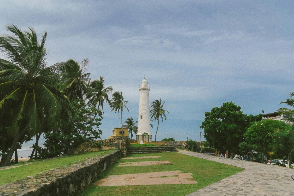 Coastal lighthouse path with ocean views in Sri Lanka